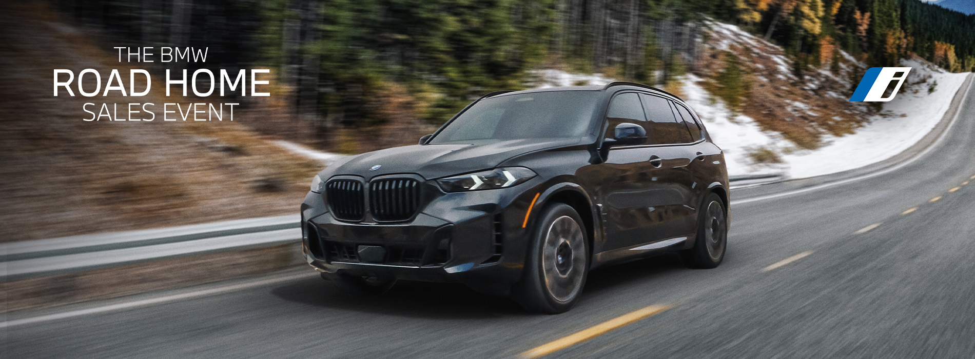 The BMW X5 xDrive50e driving a mountainous highway.  