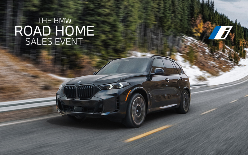  The BMW X5 xDrive50e driving a mountainous highway.
        