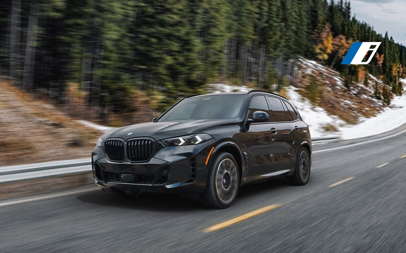 BMW X5 driving a mountainous road