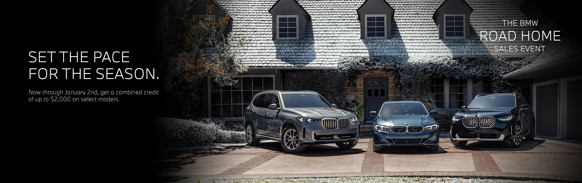BMW X5, 3 Series, and X3 parked in a driveway of a holiday decorated home.
