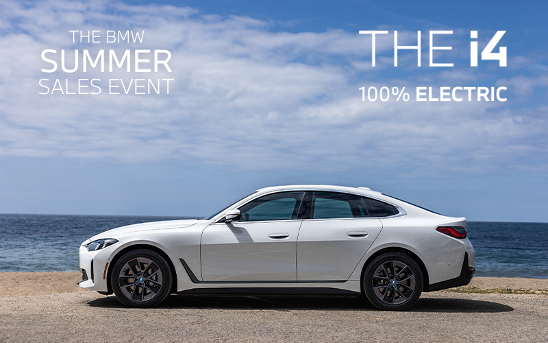 Parked BMW i4 parked on the seaside.