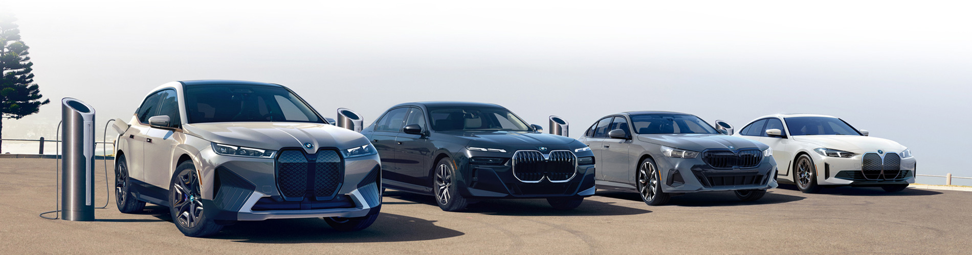 Four BMW Electric Vehicles parked in parking lot