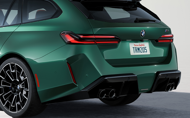 The BMW M5 Touring’s quad exhausts and lower part of the rear.