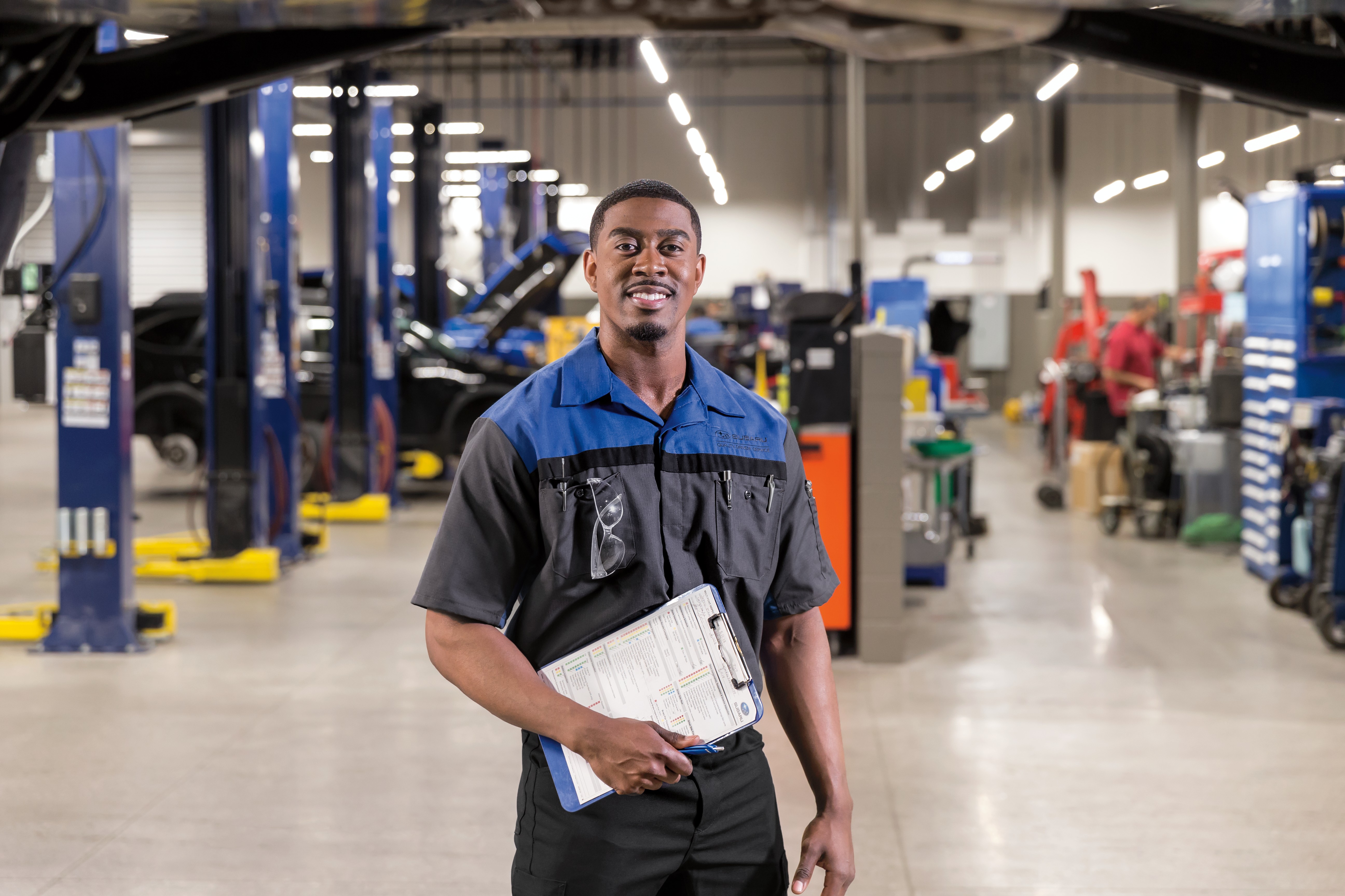 Picture of Subaru Service bays with Subarus having maintenance performed.