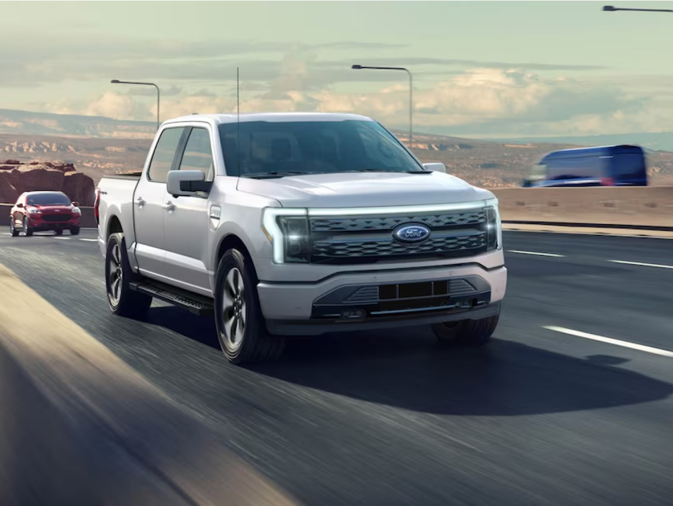 Gray Ford F-150 driving on highway