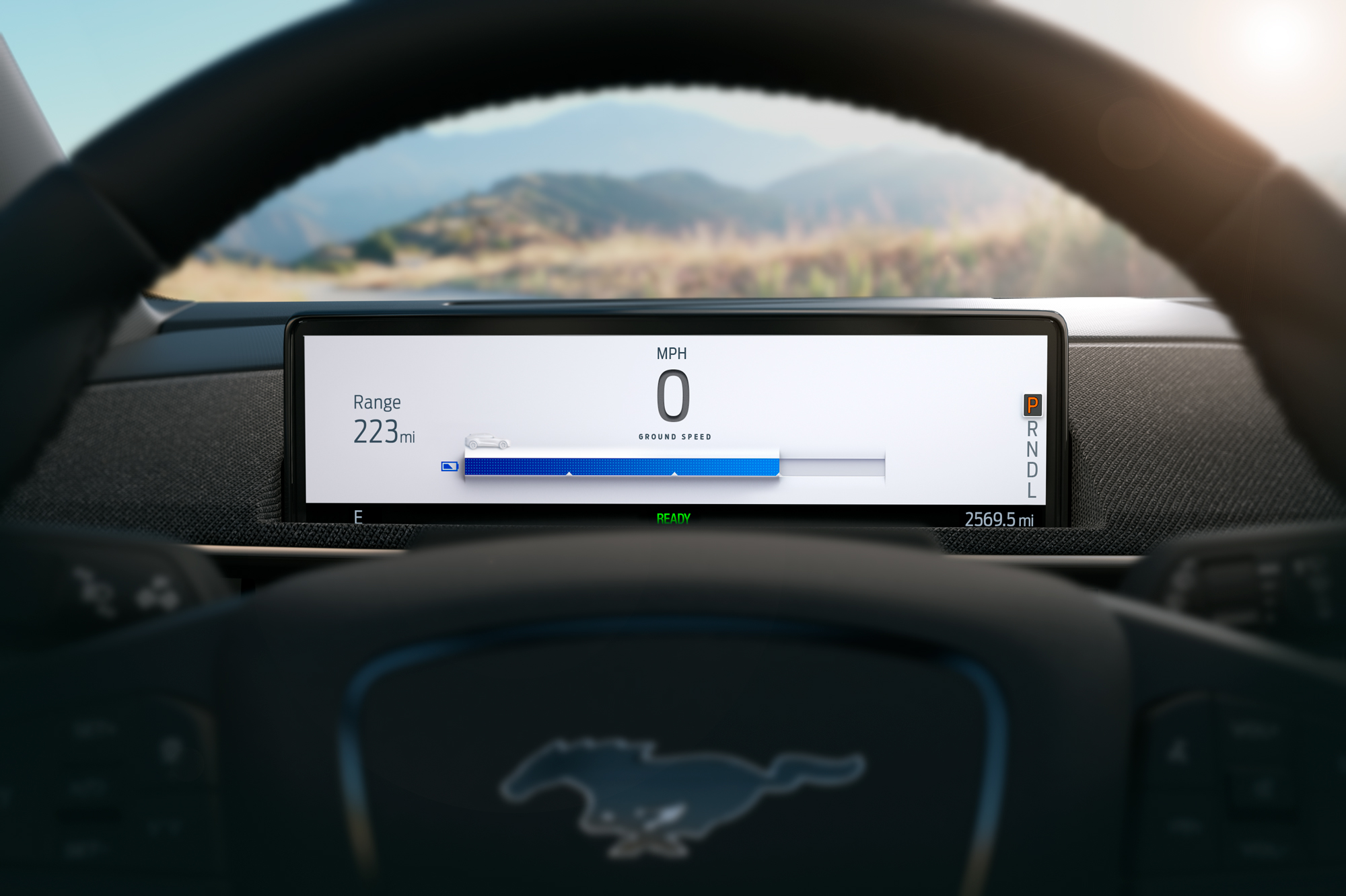 223 miles of available range being displayed on a Ford Mustang Mach-E® dashboard screen