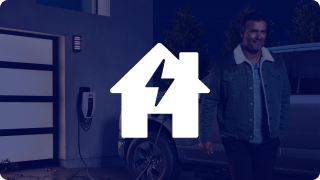 A man walking away from his Ford F-150 Lightning charging at home in his driveway with the home charging icon overlaid