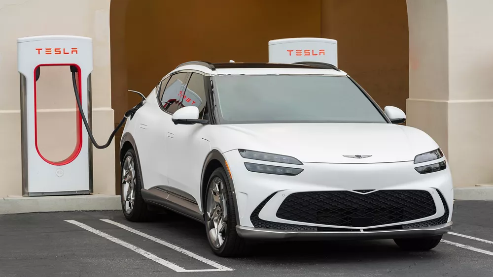 white-Genesis-at-charging-station