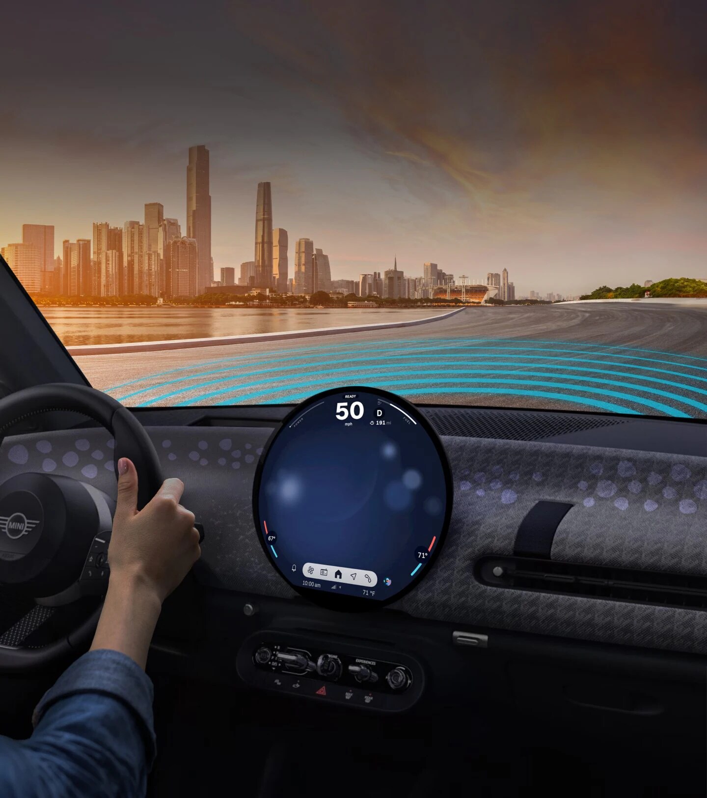 Two angles of the MINI Cooper S 4 Door against an industrial blue wall.