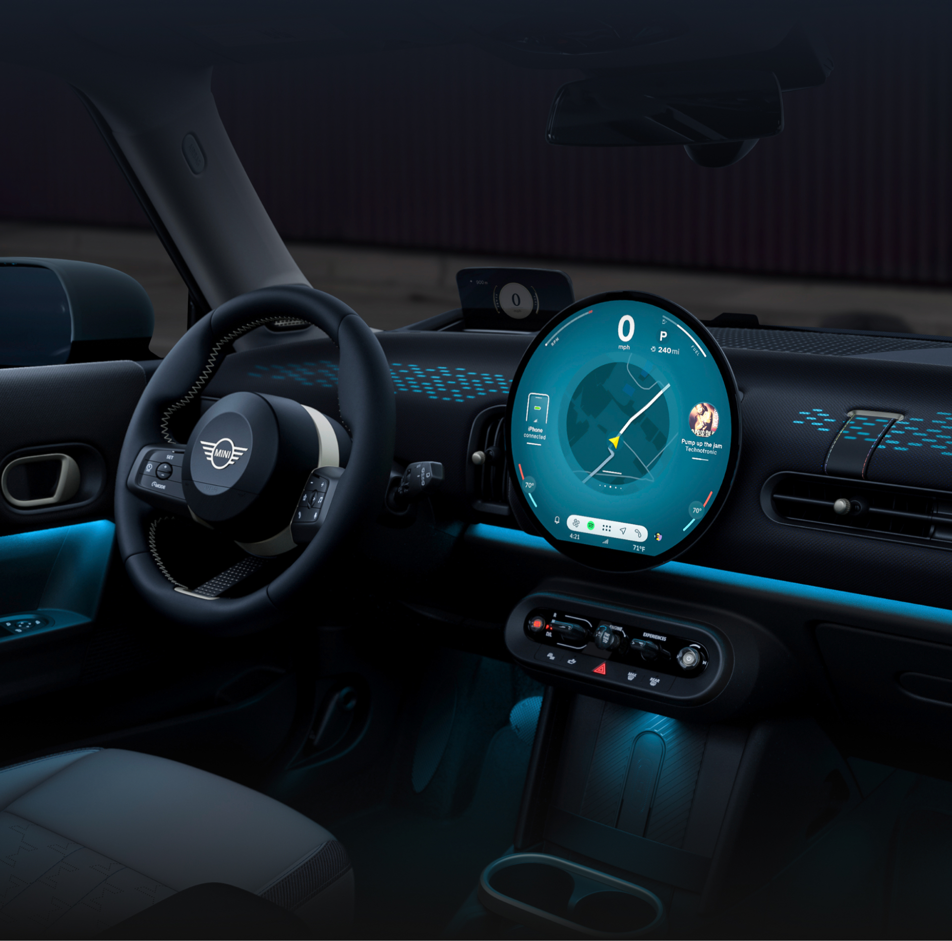 The glowing dashboard of the MINI Cooper 2 Door.