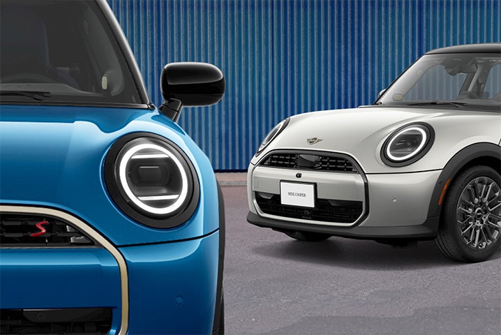 Two MINIs parked outside