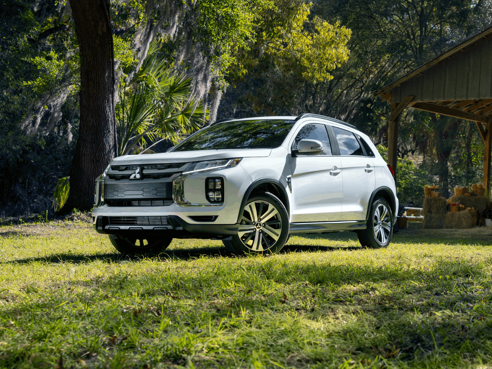 White Mitsubishi Outlander Sport angled profile