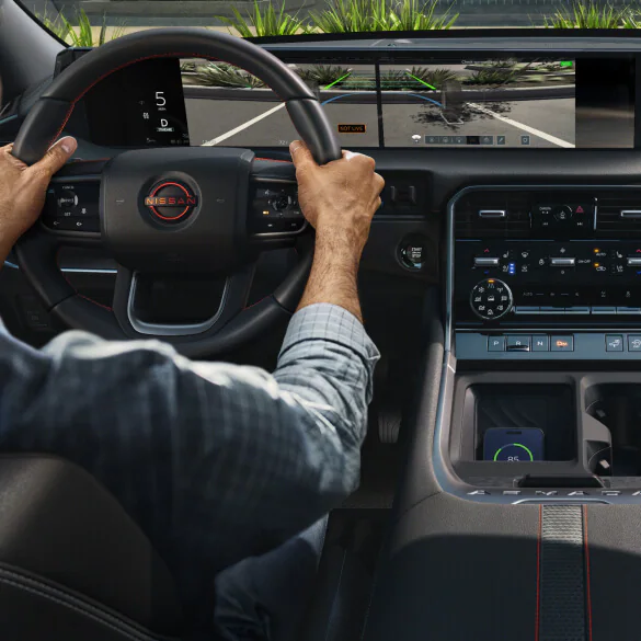 2026 Nissan Rogue interior view showing rear seat lowered for increased cargo room