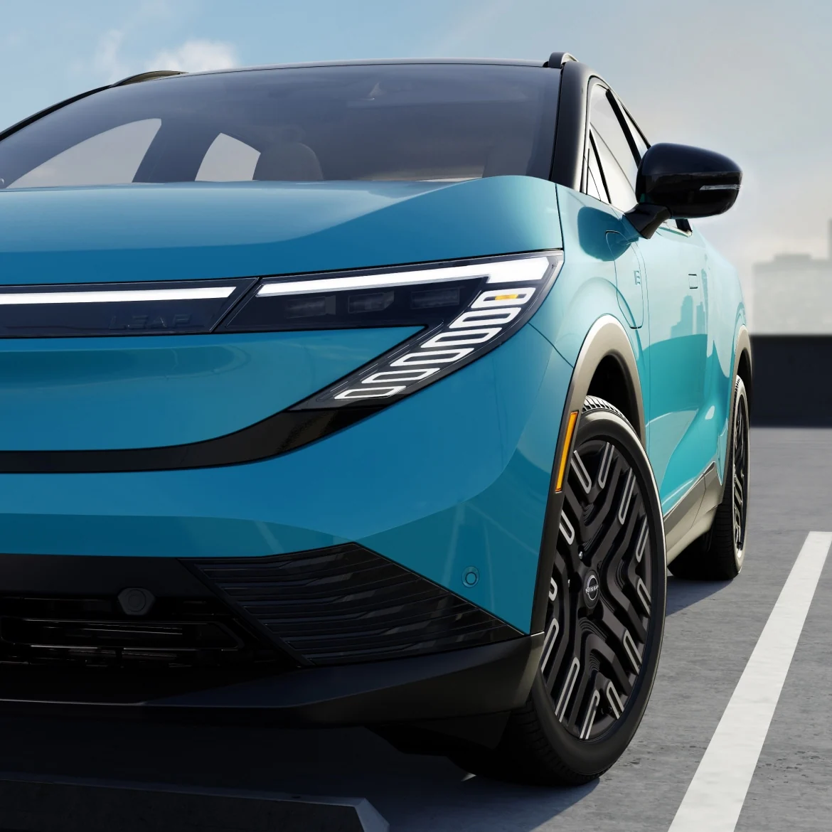 2026 Nissan LEAF 3/4 front view showing sleek aerodynamic design