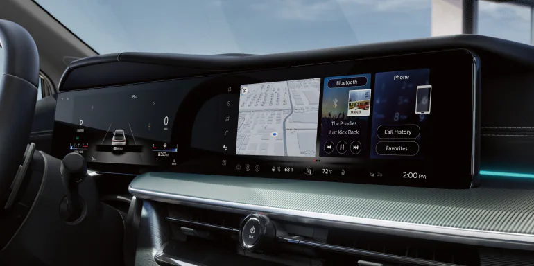 2026 Nissan LEAF interior highlighting dual 14.3 inch screens