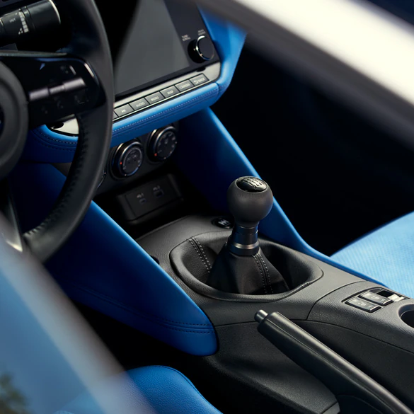 2026 Nissan Z blue interior showing manual transmission gear shifter
