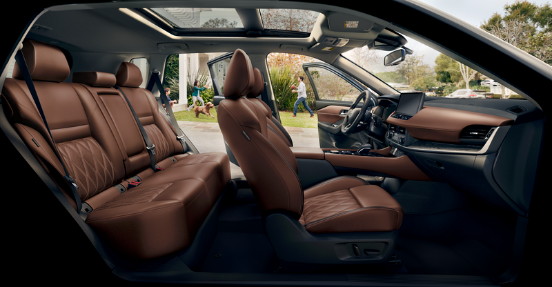 2026 Nissan Rogue interior view showing rear seat lowered for increased cargo room