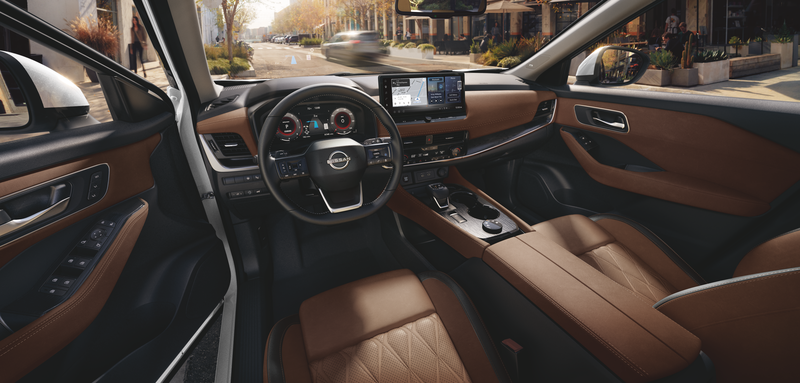 2026 Nissan Rogue interior view showing rear seat lowered for increased cargo room