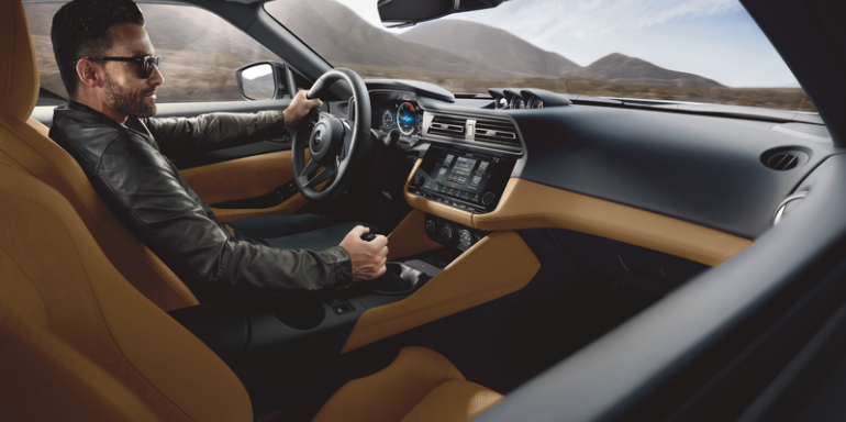 2027 Nissan Z driver in cockpit with black interior