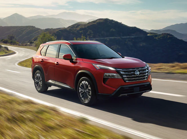 nfiniti service red-nissan-rogue-on-road