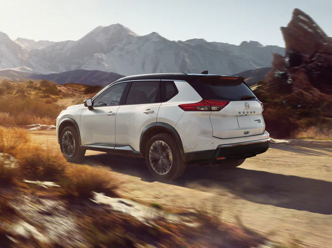 white-nissan-rogue-desertscape