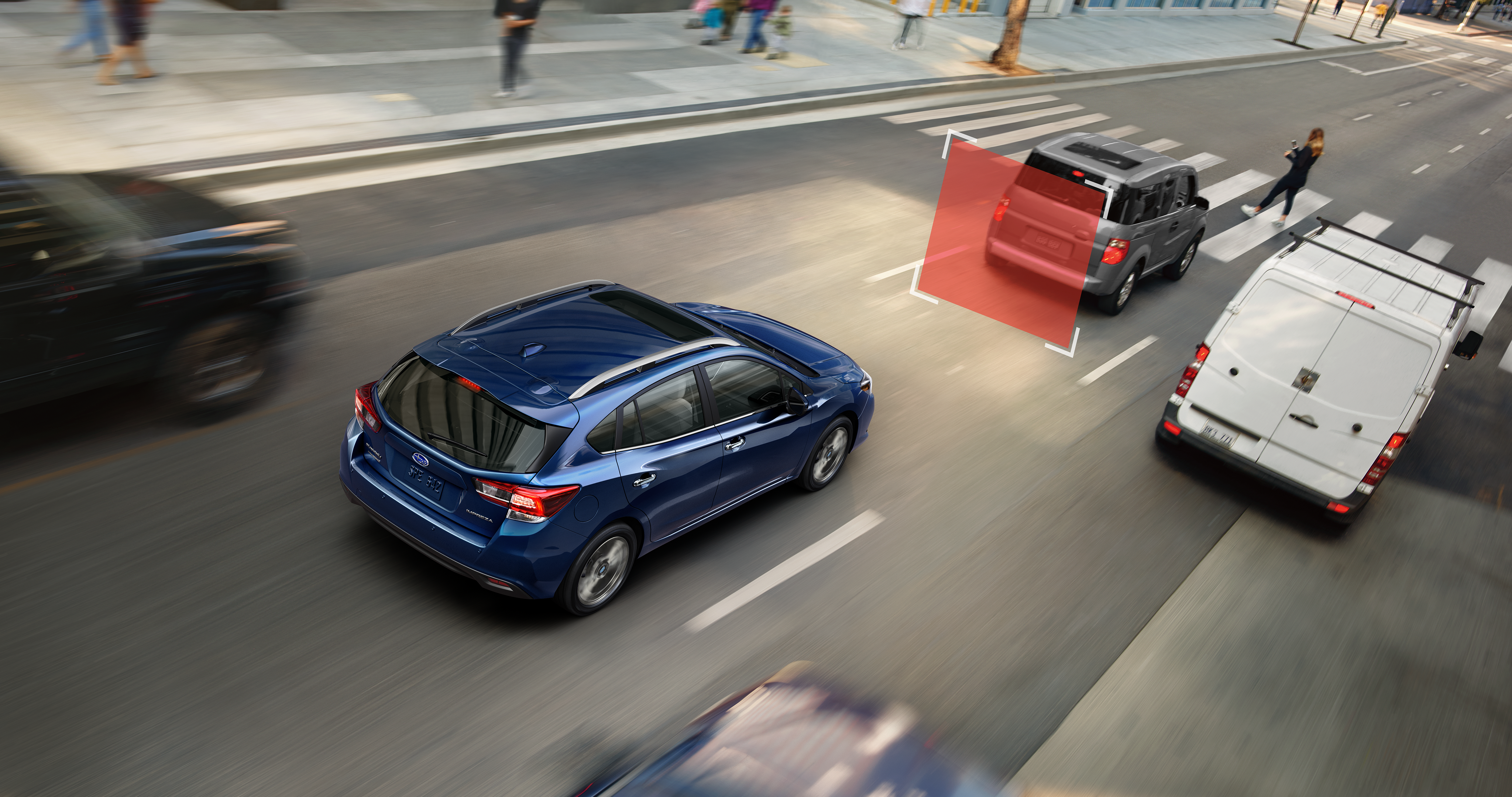 A photo illustration showing Automatic Pre-Collision Braking feature of the 2023 Impreza hatchback.