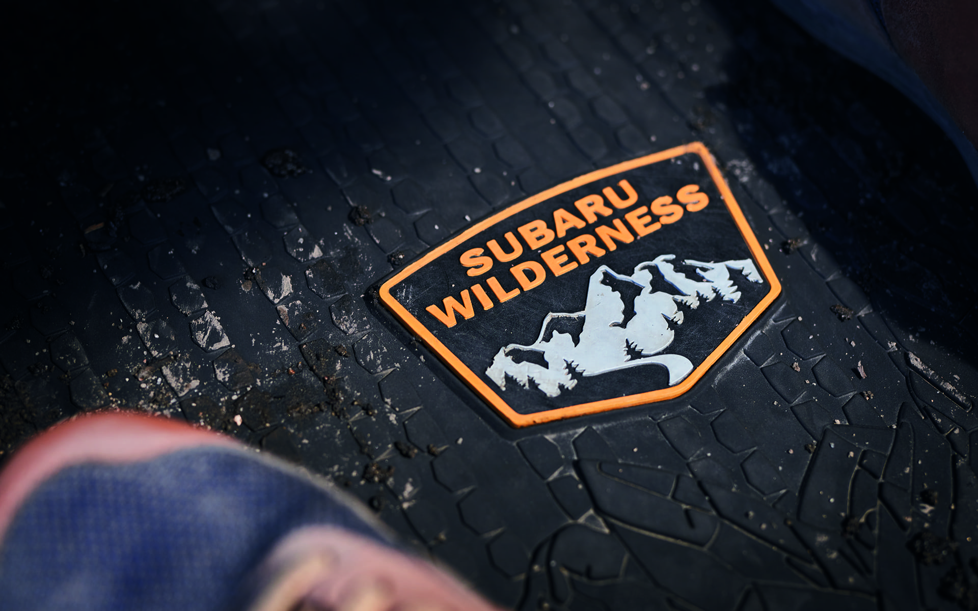 Subaru Wilderness badge on interior cabin weather mat