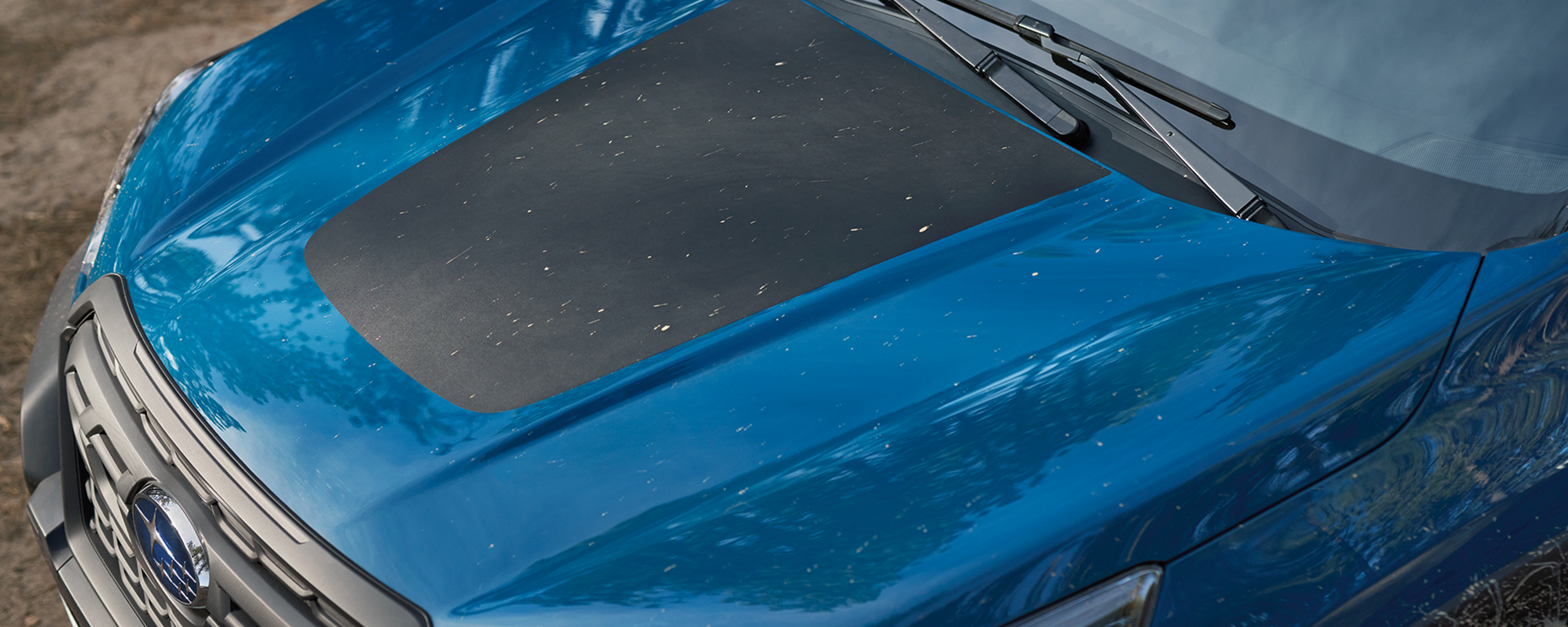 Glare-reducing hood decal