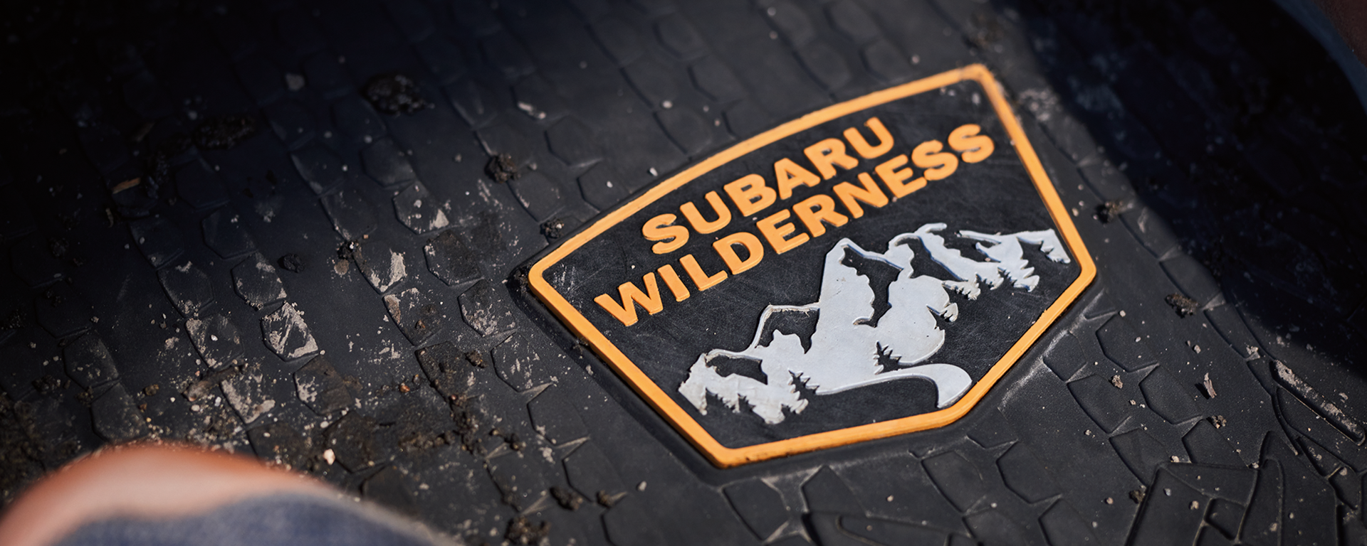 Subaru Wilderness badge on interior cabin weather mat