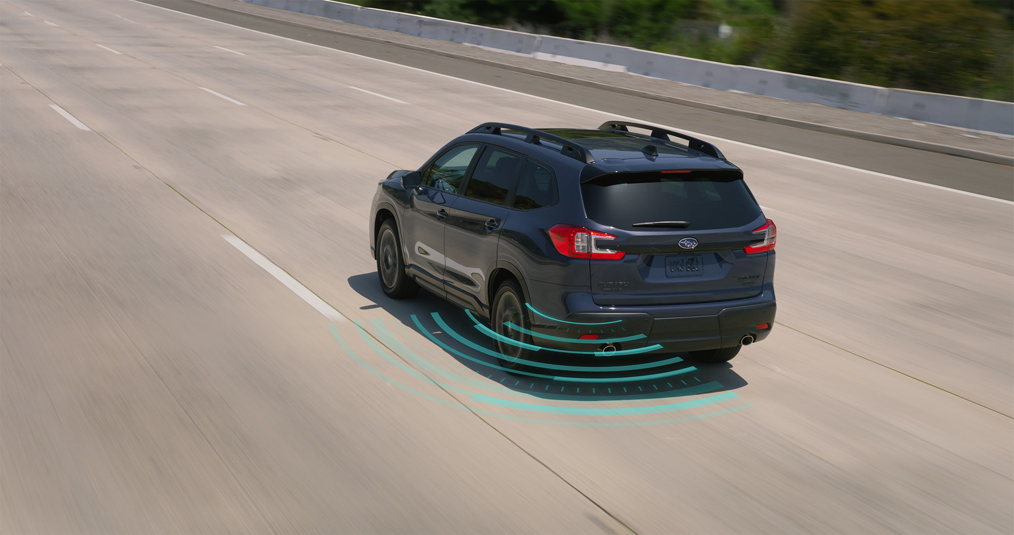 A Subaru projects an arcing line representing the Blind-Spot Detection.