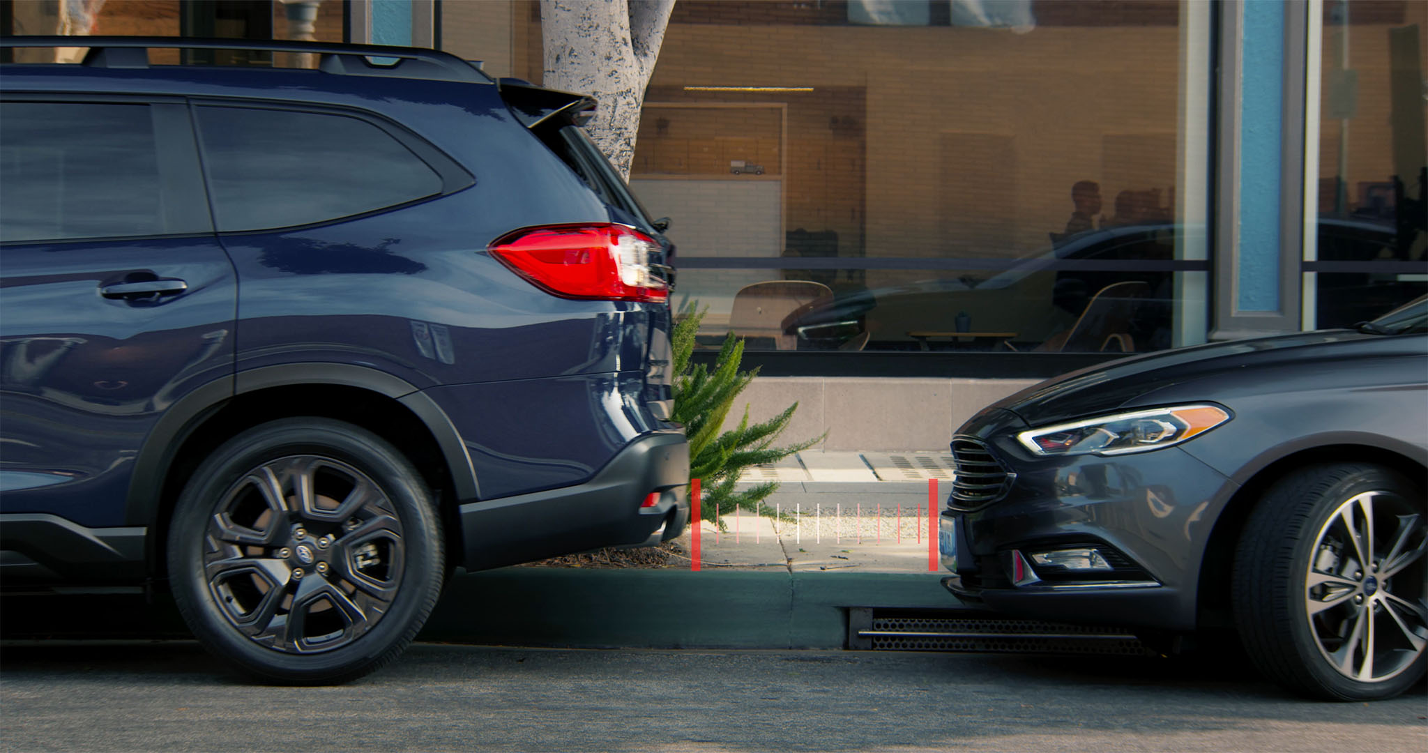 A Subaru projects straight lines representing the Reverse Automatic Braking.