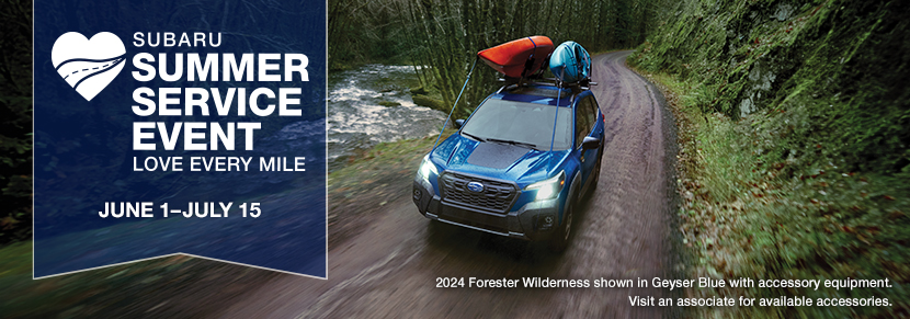 2024 Forester Wilderness shown in Geyser Blue driving on a dirt road.