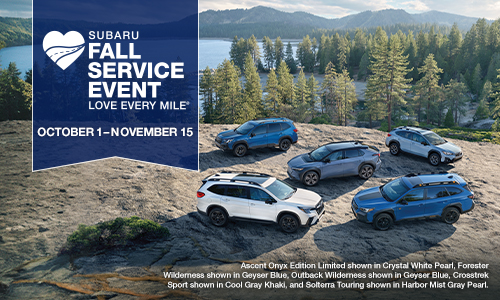 Fall Service Event. Five Subaru vehicles parked on a rocky platform.