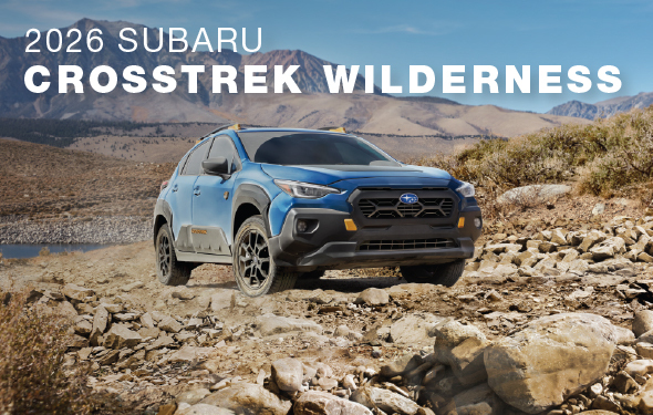 2026 Crosstrek Wilderness cresting over rocks.