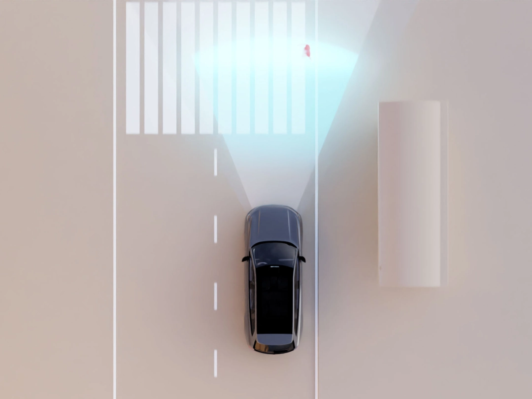 Bird’s-eye view of Volvo Cars sensing technology detecting a pedestrian on a pedestrian crossing.