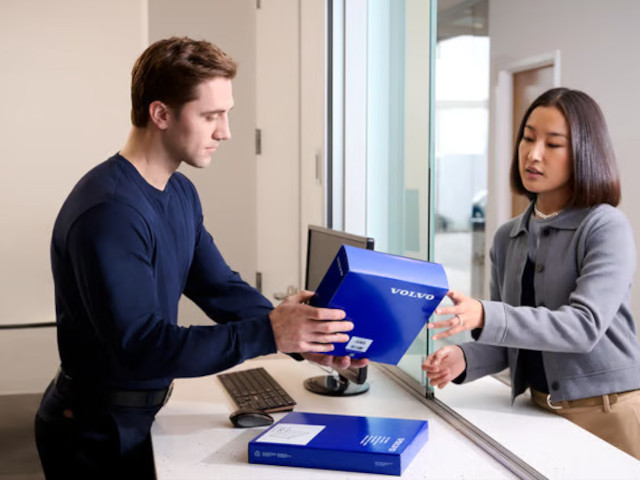 Customer purchasing genuine parts at service center